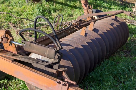 Old disc plow with rusted surface